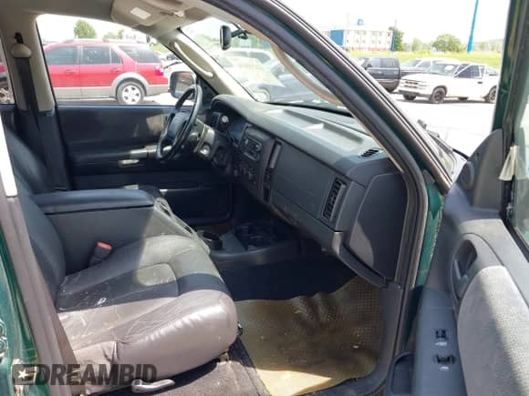 2003 Dodge Dakota SLT with VIN 1D7HG48NX3S278974, listed as a IAAI auction lot 42236636 with 105,211 mi miles and . Bid and sale history available at DreamBid. Image 5.
