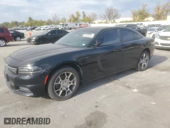 2015 Dodge Charger SE with VIN 2C3CDXFG5FH760125, listed as a Copart auction lot 82605825 with 157,759 mi miles and Clean title. Bid and sale history available at DreamBid. Image 1.
