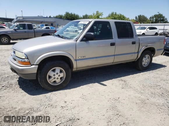 2004 Chevrolet S-10 LS z VIN 1GCDT13X14K113828, wystawiony jako Copart lot #64229655 z przebiegiem 100 013 mil mil oraz Szkoda całkowita • Salvage title. Historia ofert i sprzedaży dostępna na DreamBid. Obrazek 1.