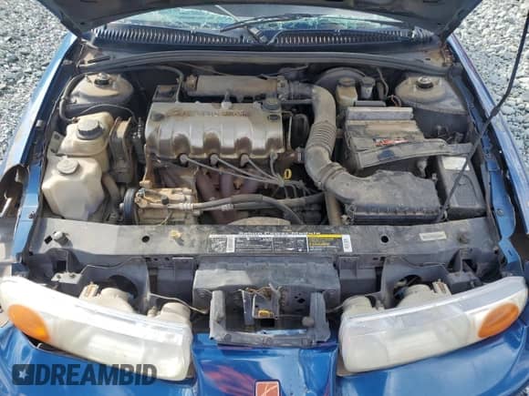 2000 Saturn SL with VIN 1G8ZG5281YZ256197, listed as a Copart auction lot 80046594 with Not provided miles and Salvage title. Bid and sale history available at DreamBid. Image 12.