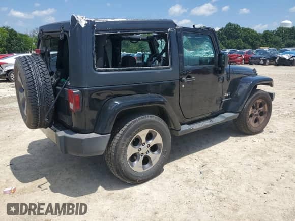 2016 Jeep Wrangler Sahara with VIN 1C4AJWBG2GL128652, listed as a Copart auction lot 62870825 with 80,314 mi miles and Salvage title. Bid and sale history available at DreamBid. Image 3.
