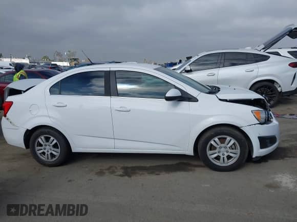 2014 Chevrolet Sonic LT with VIN 1G1JC5SH7E4134055, listed as a IAAI auction lot 43176468 with 132,975 mi miles and . Bid and sale history available at DreamBid. Image 12.