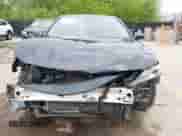 2021 Toyota Camry Hybrid XLE with VIN 4T1F31AK8MU563752, listed as a IAAI auction lot 42134620 with 19,484 mi miles and . Bid and sale history available at DreamBid. Image 6.