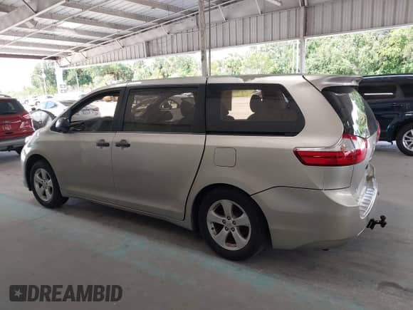 2015 Toyota Sienna L with VIN 5TDZK3DCXFS572089, listed as a IAAI auction lot 43201327 with 120,641 mi miles and . Bid and sale history available at DreamBid. Image 14.