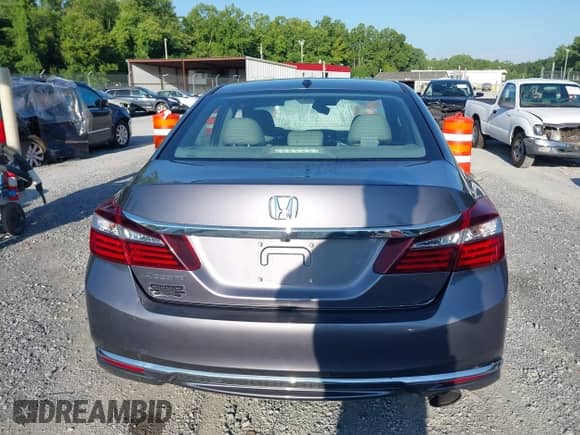 2016 Honda Accord EX-L with VIN 1HGCR2F98GA009040, listed as a IAAI auction lot 42711353 with 166,258 mi miles and . Bid and sale history available at DreamBid. Image 16.