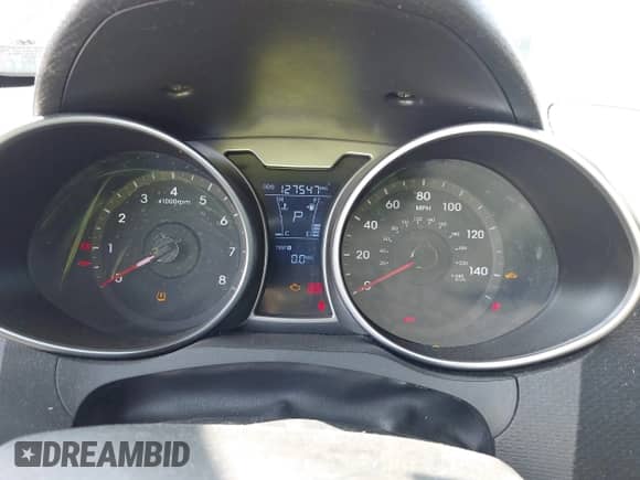 2013 Hyundai Veloster w/Black Int z VIN KMHTC6AD4DU101917, wystawiony jako IAAI lot #43406444 z przebiegiem 124 547 mil mil oraz . Historia ofert i sprzedaży dostępna na DreamBid. Obrazek 7.