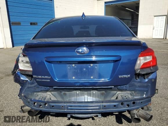 2015 Subaru WRX Premium with VIN JF1VA1F62F9821793, listed as a Copart auction lot 69109125 with 114,632 mi miles and Salvage title. Bid and sale history available at DreamBid. Image 6.