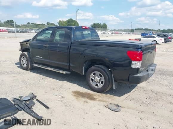2012 Toyota Tundra z VIN 5TFRU5F11CX027728, wystawiony jako IAAI lot #43122765 z przebiegiem 196 119 mil mil oraz . Historia ofert i sprzedaży dostępna na DreamBid. Obrazek 3.