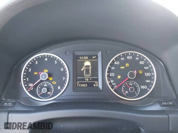 2013 Volkswagen Tiguan S with VIN WVGAV3AX5DW559819, listed as a IAAI auction lot 43436570 with 113,423 mi miles and . Bid and sale history available at DreamBid. Image 7.