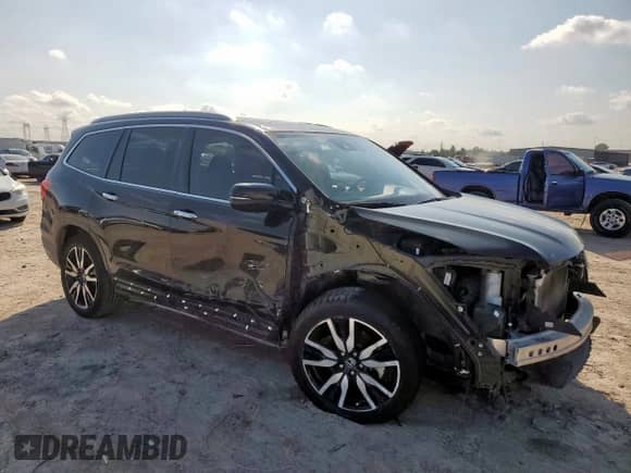 2021 Honda Pilot Touring 7-Passenger z VIN 5FNYF5H68MB013416, wystawiony jako Copart lot #89678575 z przebiegiem 104 706 mil mil oraz Szkoda całkowita • Salvage title. Historia ofert i sprzedaży dostępna na DreamBid. Obrazek 4.