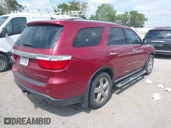 2013 Dodge Durango Citadel with VIN 1C4RDJEG1DC675030, listed as a IAAI auction lot 42776817 with 179,706 mi miles and . Bid and sale history available at DreamBid. Image 4.