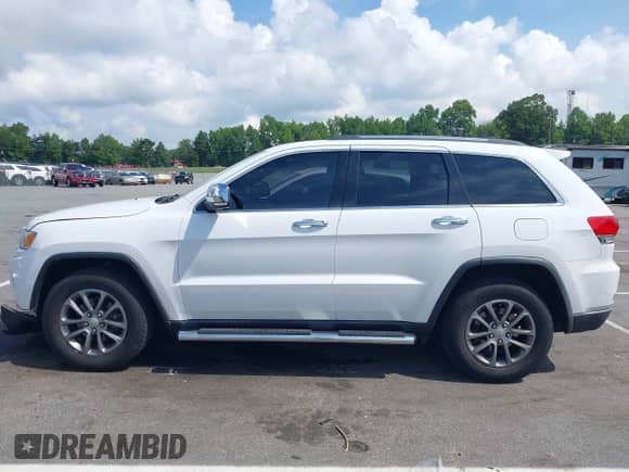 2014 Jeep Grand Cherokee Limited with VIN 1C4RJFBG4EC351033, listed as a IAAI auction lot 42870546 with 194,263 mi miles and . Bid and sale history available at DreamBid. Image 14.