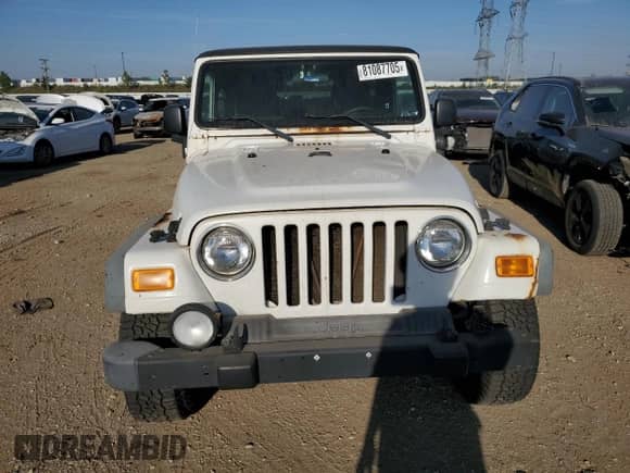2004 Jeep Wrangler Sport z VIN 1J4FA49S14P725603, wystawiony jako Copart lot #81087705 z przebiegiem 212 553 mil mil oraz Czysty tytuł • Clean title. Historia ofert i sprzedaży dostępna na DreamBid. Obrazek 5.