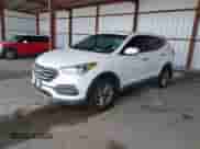 2018 Hyundai Santa Fe 2.4L z VIN 5XYZT3LB5JG516329, wystawiony jako IAAI lot #43392532 z przebiegiem 94 128 mil mil oraz . Historia ofert i sprzedaży dostępna na DreamBid. Obrazek 2.