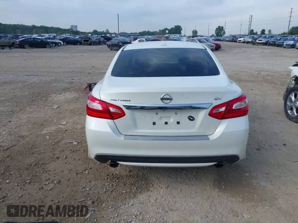 2016 Nissan Altima SR z VIN 1N4AL3AP9GC176651, wystawiony jako IAAI lot #42682340 z przebiegiem 118 712 mil mil oraz . Historia ofert i sprzedaży dostępna na DreamBid. Obrazek 16.