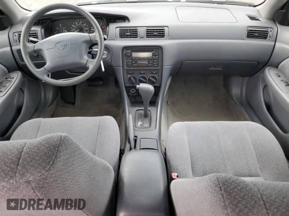 2001 Toyota Camry CE с VIN JT2BG22K510578541, выставлен на аукционе Copart как лот 72061075 с пробегом 218 624 миль миль и Списание • Salvage title. История ставок и продаж доступна на DreamBid. Изображение 8.