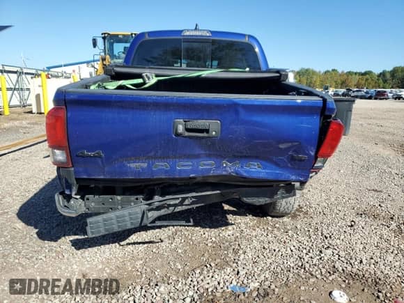 2023 Toyota Tacoma TRD Off Road z VIN 3TMCZ5AN9PM606527, wystawiony jako Copart lot #84165555 z przebiegiem 39 740 mil mil oraz Szkoda całkowita • Salvage title. Historia ofert i sprzedaży dostępna na DreamBid. Obrazek 6.