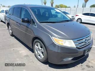 2012 Honda Odyssey Touring с VIN 5FNRL5H94CB049092, выставлен на аукционе IAAI как лот 42644487 с пробегом 166 140 миль миль и . История ставок и продаж доступна на DreamBid. Изображение 1.