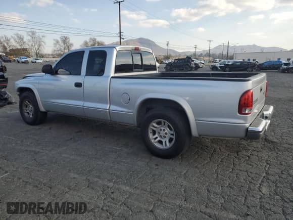 2004 Dodge Dakota SLT with VIN 1D7GL42N94S576921, listed as a Copart auction lot 89334585 with 175,085 mi miles and Salvage title. Bid and sale history available at DreamBid. Image 2.