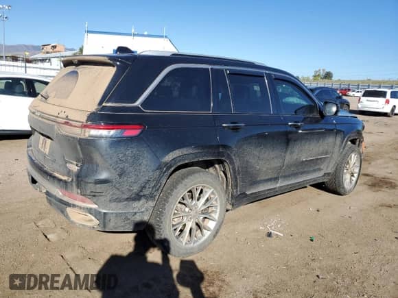 2023 Jeep Grand Cherokee Summit with VIN 1C4RJHEG7PC515787, listed as a Copart auction lot 85474935 with 50,647 mi miles and Salvage title. Bid and sale history available at DreamBid. Image 3.