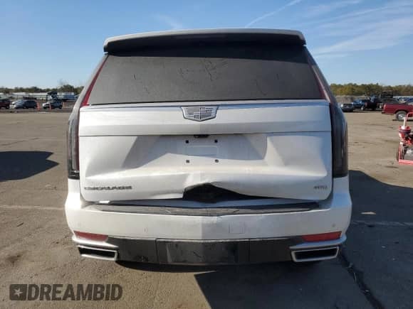 2022 Cadillac Escalade Premium Luxury с VIN 1GYS4BKL1NR146775, выставлен на аукционе Copart как лот 42958015 с пробегом Не указан миль и Списание • Salvage title. История ставок и продаж доступна на DreamBid. Изображение 6.