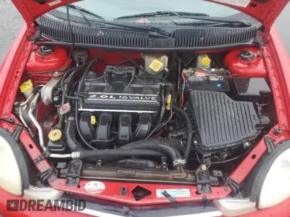 2000 Dodge Neon Highline with VIN 1B3ES46C0YD713835, listed as a Copart auction lot 77951064 with 96,173 mi miles and Salvage title. Bid and sale history available at DreamBid. Image 11.