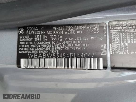 2004 BMW 3 Series 330Ci with VIN WBABW53454PL44047, listed as a Copart auction lot 82557435 with 74,299 mi miles and Salvage title. Bid and sale history available at DreamBid. Image 12.