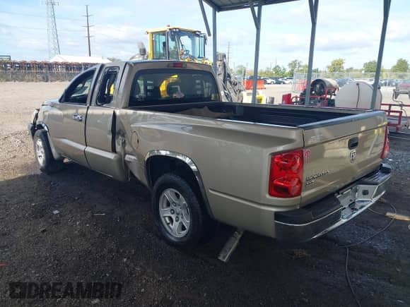 2005 Dodge Dakota SLT with VIN 1D7HE42K15S214328, listed as a IAAI auction lot 43347025 with 192,828 mi miles and . Bid and sale history available at DreamBid. Image 3.