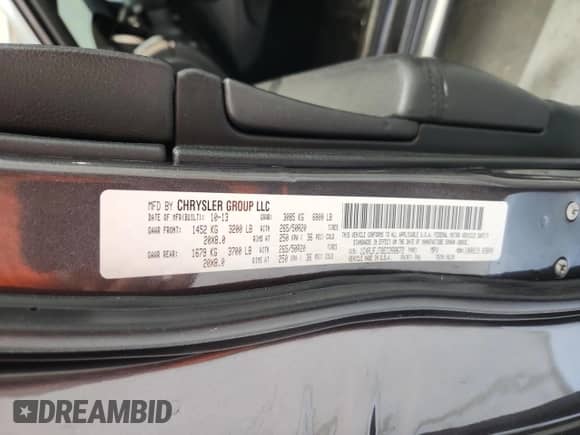 2014 Jeep Grand Cherokee Summit with VIN 1C4RJFJT8EC268672, listed as a Copart auction lot 69583715 with 157,725 mi miles and Clean title. Bid and sale history available at DreamBid. Image 13.