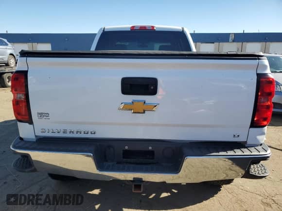 2018 Chevrolet Silverado 1500 LT z VIN 3GCUKRECXJG404231, wystawiony jako Copart lot #84013935 z przebiegiem 89 839 mil mil oraz Czysty tytuł • Clean title. Historia ofert i sprzedaży dostępna na DreamBid. Obrazek 6.