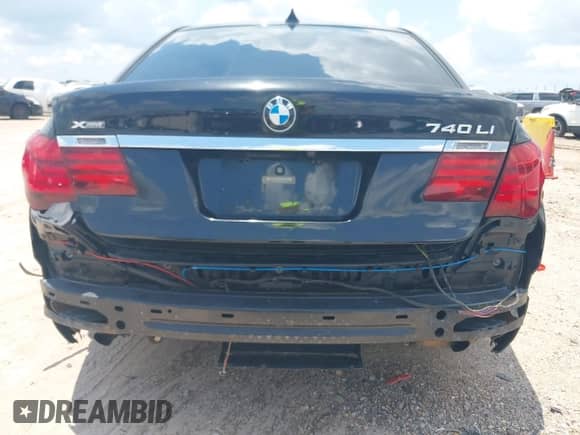 2013 BMW 7 Series 740Li xDrive with VIN WBAYF4C55DD127936, listed as a IAAI auction lot 42559835 with 82,976 mi miles and . Bid and sale history available at DreamBid. Image 16.