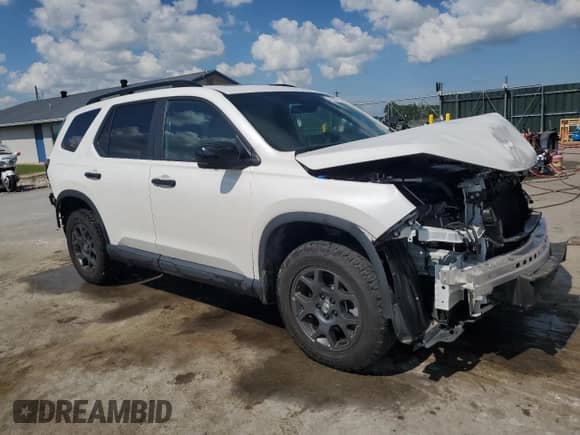 2024 Honda Pilot TrailSport с VIN 5FNYG1H66RB037579, выставлен на аукционе Copart как лот 63337795 с пробегом 25 833 миль миль и Списание • Salvage title. История ставок и продаж доступна на DreamBid. Изображение 4.