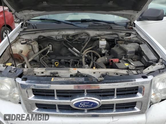 2011 Ford Escape XLT с VIN 1FMCU9D73BKB74256, выставлен на аукционе Copart как лот 85528595 с пробегом 222 570 миль миль и Списание • Salvage title. История ставок и продаж доступна на DreamBid. Изображение 12.