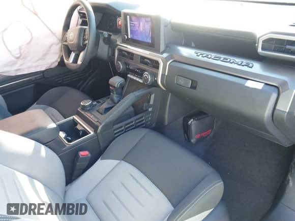 2024 Toyota Tacoma SR5 with VIN 3TYLB5JN0RT029530, listed as a IAAI auction lot 41213742 with 5,370 mi miles and . Bid and sale history available at DreamBid. Image 5.