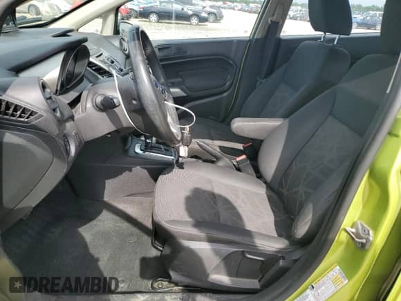 2012 Ford Fiesta SES with VIN 3FADP4FJ6CM117710, listed as a Copart auction lot 64371335 with 92,029 mi miles and Salvage title. Bid and sale history available at DreamBid. Image 7.