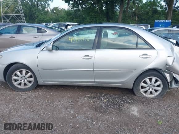 2004 Toyota Camry LE with VIN 4T1BE32K14U896992, listed as a IAAI auction lot 42709172 with 153,248 mi miles and . Bid and sale history available at DreamBid. Image 15.