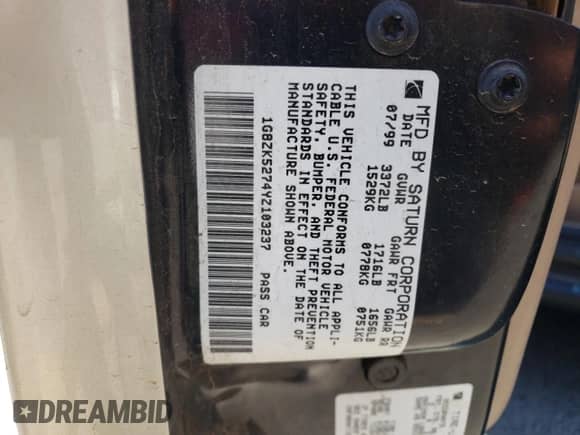 2000 Saturn SL with VIN 1G8ZK5274YZ103237, listed as a Copart auction lot 60558105 with 126,320 mi miles and Salvage title. Bid and sale history available at DreamBid. Image 13.