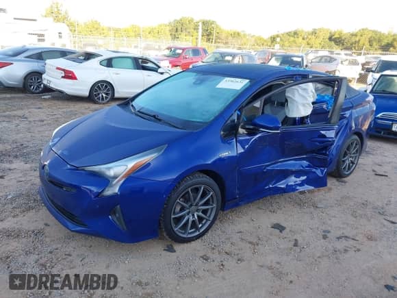 2018 Toyota Prius Two Eco with VIN JTDKARFU4J3545414, listed as a IAAI auction lot 43362631 with 164,352 mi miles and . Bid and sale history available at DreamBid. Image 2.
