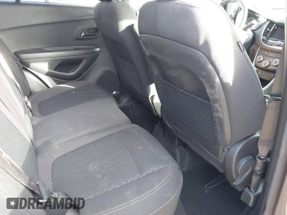 2021 Chevrolet Trax LS z VIN KL7CJNSB4MB344296, wystawiony jako IAAI lot #42976537 z przebiegiem 6 473 mil mil oraz . Historia ofert i sprzedaży dostępna na DreamBid. Obrazek 8.