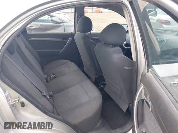 2008 Chevrolet Aveo LT z VIN KL1TG56678B069082, wystawiony jako IAAI lot #42314421 z przebiegiem 164 296 mil mil oraz . Historia ofert i sprzedaży dostępna na DreamBid. Obrazek 8.