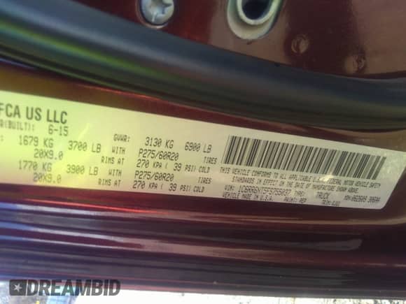 2015 Ram 1500 Laramie z VIN 1C6RR6NT5FS755037, wystawiony jako IAAI lot #41186422 z przebiegiem 128 774 mil mil oraz . Historia ofert i sprzedaży dostępna na DreamBid. Obrazek 9.