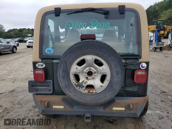 1997 Jeep Wrangler SE with VIN 1J4FY29PXVP508242, listed as a Copart auction lot 81254905 with 188,444 mi miles and Salvage title. Bid and sale history available at DreamBid. Image 6.