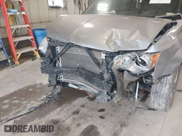 2014 Dodge Grand Caravan American Value with VIN 2C4RDGBG3ER231082, listed as a IAAI auction lot 42530487 with 86,045 mi miles and . Bid and sale history available at DreamBid. Image 6.