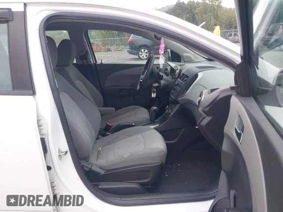 2014 Chevrolet Sonic LS with VIN 1G1JA6SH7E4139154, listed as a IAAI auction lot 43232250 with 140,997 mi miles and . Bid and sale history available at DreamBid. Image 5.