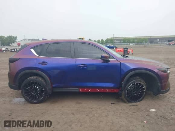 2022 Mazda CX-5 S Carbon Edition with VIN JM3KFBCM0N1584457, listed as a IAAI auction lot 42743636 with 27,287 mi miles and . Bid and sale history available at DreamBid. Image 13.