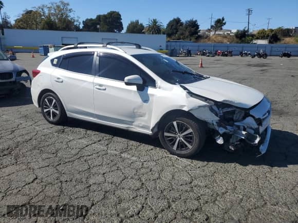 2019 Subaru Impreza Premium with VIN 4S3GTAD66K3736081, listed as a Copart auction lot 82318195 with 126,609 mi miles and Salvage title. Bid and sale history available at DreamBid. Image 4.