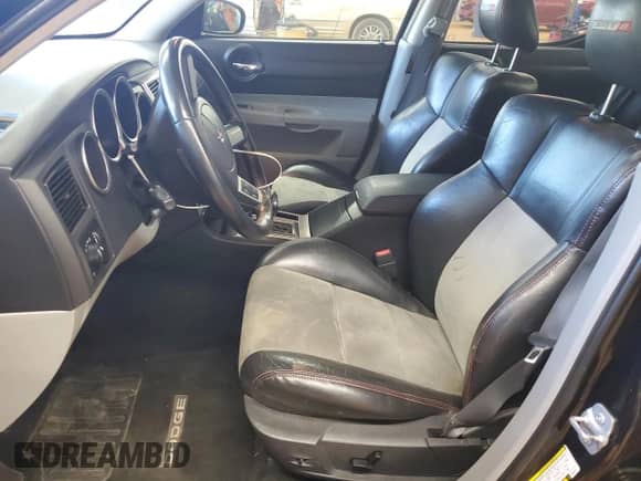 2007 Dodge Charger SRT-8 with VIN 2B3KA73W67H652417, listed as a Copart auction lot 70518705 with 75,440 mi miles and Salvage title. Bid and sale history available at DreamBid. Image 7.