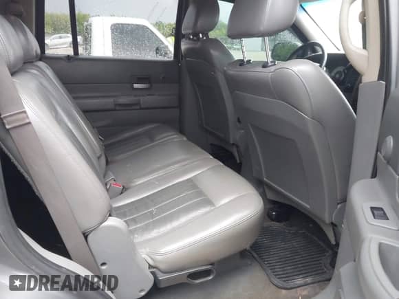 2005 Dodge Durango Limited with VIN 1D4HB58D85F582423, listed as a IAAI auction lot 42631605 with 213,601 mi miles and . Bid and sale history available at DreamBid. Image 8.
