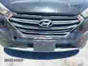 2018 Hyundai Tucson Value z VIN KM8J33A29JU796444, wystawiony jako IAAI lot #42527201 z przebiegiem 76 855 mil mil oraz . Historia ofert i sprzedaży dostępna na DreamBid. Obrazek 6.