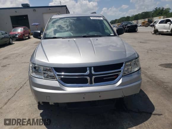 2018 Dodge Journey SE with VIN 3C4PDCAB0JT525021, listed as a Copart auction lot 64236265 with 104,675 mi miles and Salvage title. Bid and sale history available at DreamBid. Image 5.
